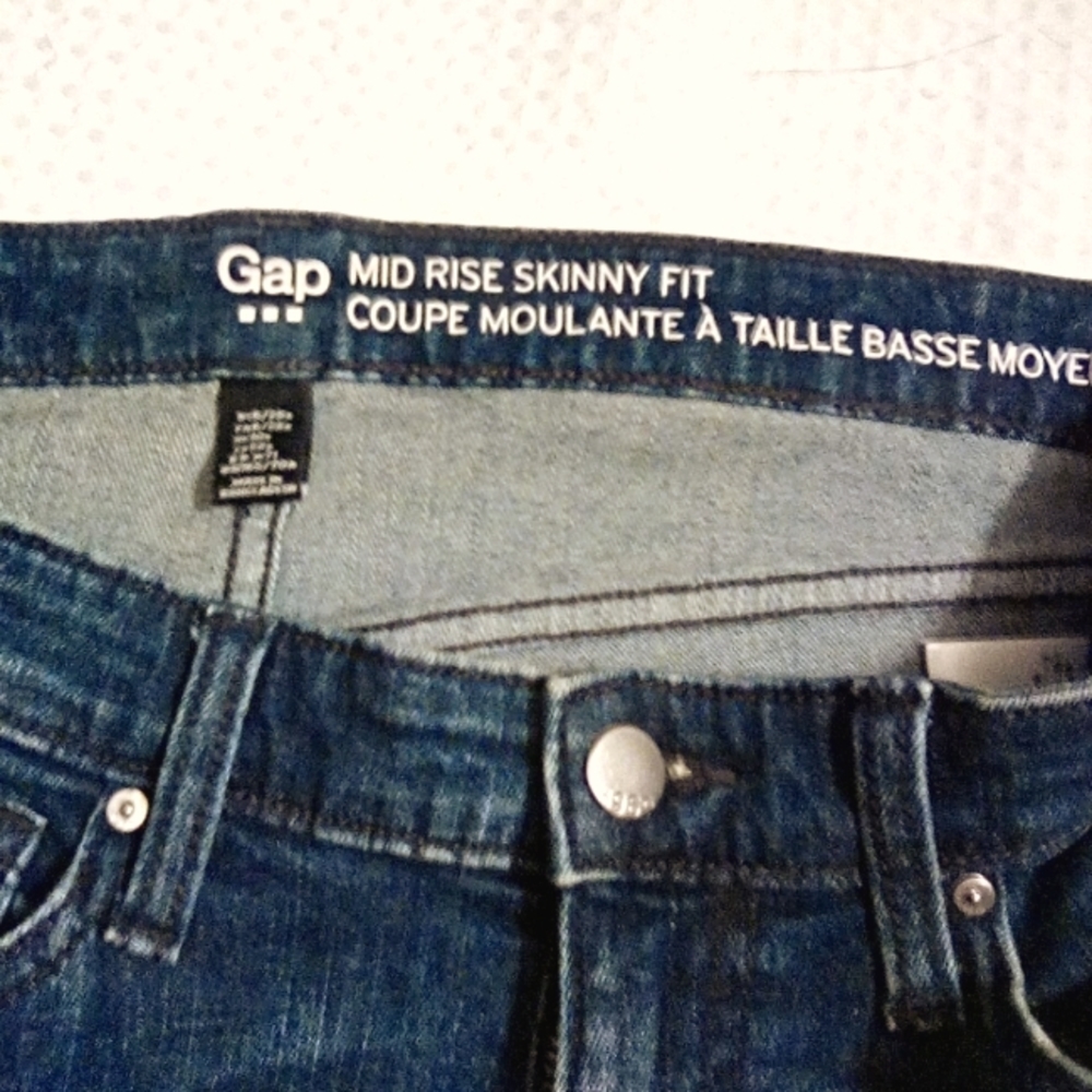 - GAP Mid-rise Girlfriend Jeans